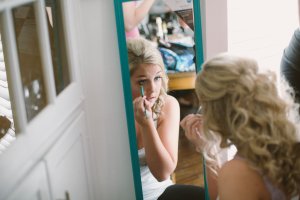wedding makeup in mirror